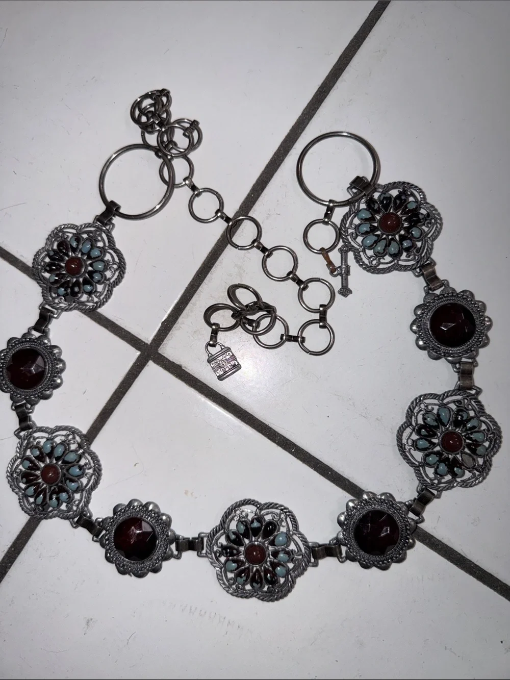 Silver tone Floral Link Belt with Garnet Accents